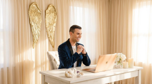 Matt Fraser sitting at a desk with a laptop.